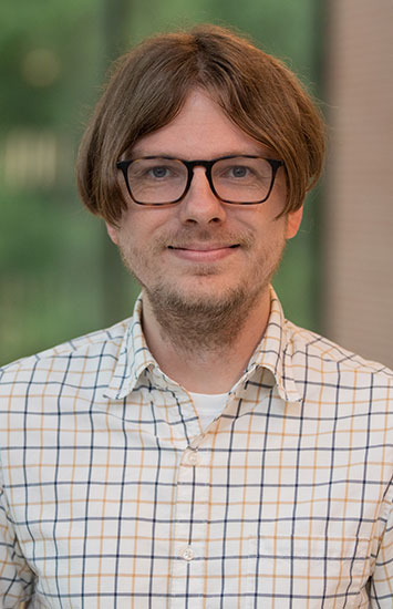 headshot of brent harrison