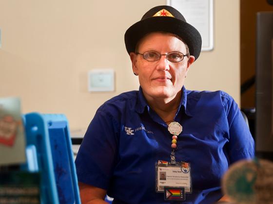 Cancer Patient Sits at he Desk